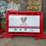 Valla de contención de publico